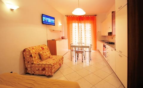 Apartment (2 Bedrooms) | Living area | 55-inch TV with cable channels