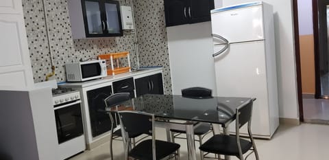 Economy Apartment | Private kitchen | Full-size fridge, oven, cookware/dishes/utensils