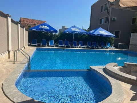 Seasonal outdoor pool, pool umbrellas, sun loungers