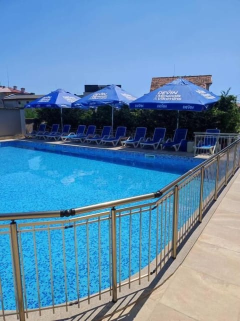 Seasonal outdoor pool, pool umbrellas, sun loungers