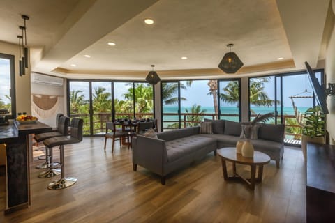 Panoramic Suite, 2 Bedrooms, Sea View, Beachfront | Living area