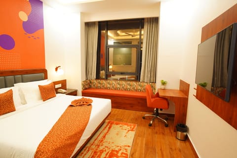 Executive Room | Premium bedding, minibar, in-room safe, desk