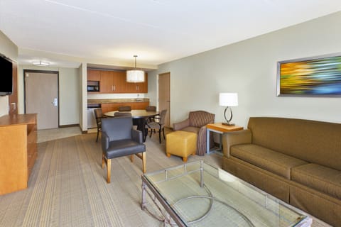 Suite, 1 King Bed, Jetted Tub | Desk, iron/ironing board, free cribs/infant beds, free WiFi