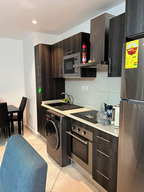 Luxury Apartment, 1 Bedroom | Private kitchen | Full-size fridge, microwave, oven, stovetop