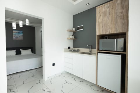 Standard Double Room | Private kitchen | Mini-fridge, microwave, toaster