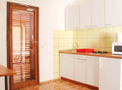 Apartment (Superior Two Bedroom Apartment with T) | Private kitchen | Fridge