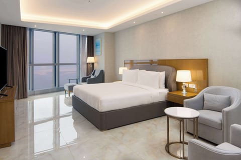 Deluxe Room, 3 Bedrooms | Premium bedding, minibar, in-room safe, desk