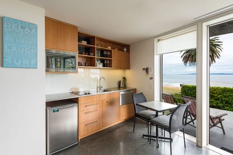Honeymoon Studio Suite, 1 King Bed, Ocean View | Private kitchen | Full-size fridge, microwave, stovetop, coffee/tea maker