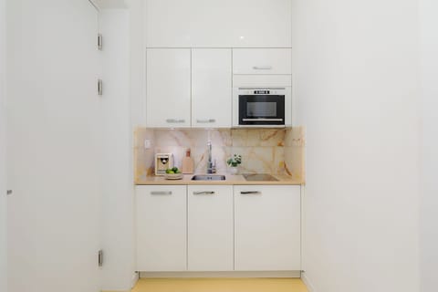 2 Bedroom Apartment Junior | Private kitchen | Full-size fridge, microwave, stovetop, coffee/tea maker