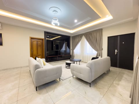 Luxury Apartment, 3 Bedrooms | Living area | 50-inch Smart TV with satellite channels