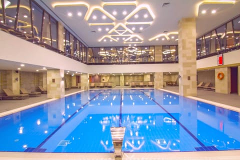 Indoor pool, open 10:00 AM to 6:00 PM, sun loungers