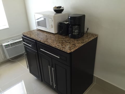 Full-size fridge, microwave, coffee/tea maker, toaster