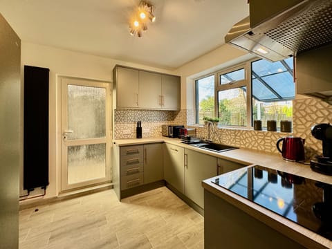 Family House | Private kitchen | Full-size fridge, microwave, oven, dishwasher