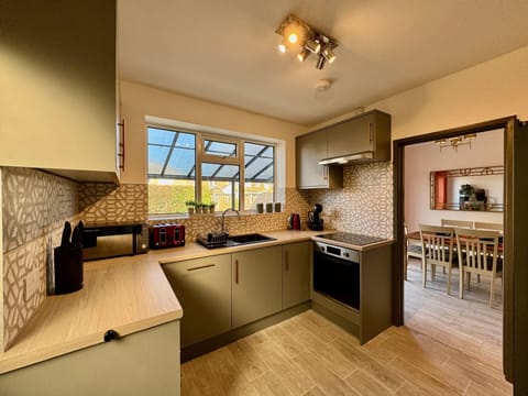 Family House | Private kitchen | Full-size fridge, microwave, oven, dishwasher