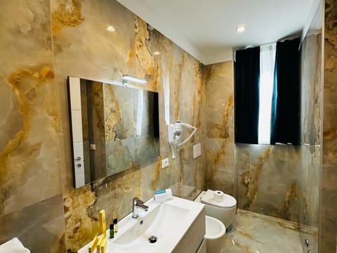 Superior Triple Room | Bathroom | Shower, rainfall showerhead, hair dryer, slippers