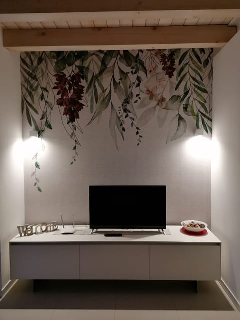 Apartment, 1 King Bed | Living area | LED TV