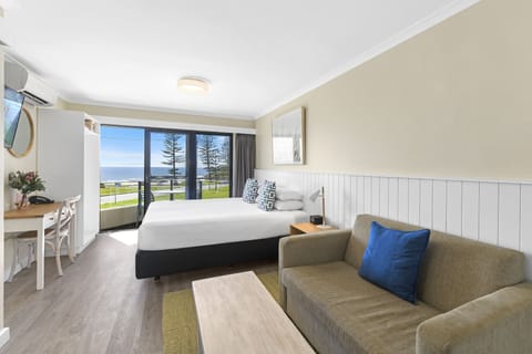 Superior Ocean View Room | Minibar, in-room safe, desk, laptop workspace