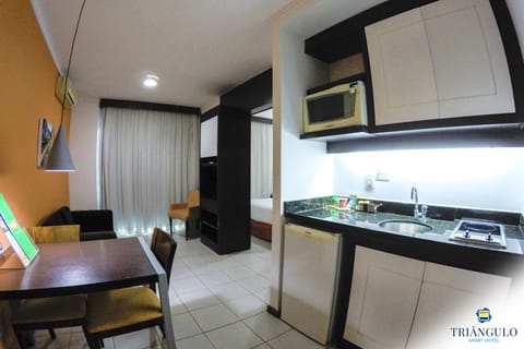 Executive Suite | Living area | 32-inch LCD TV with cable channels, TV