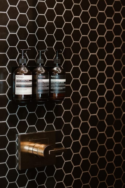 Luxury Suite, Mountain View | Bathroom | Shower, rainfall showerhead, designer toiletries, hair dryer