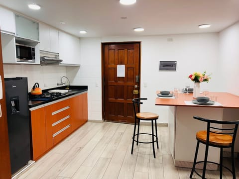 Deluxe Duplex | Private kitchen | Microwave, oven, dishwasher, blender