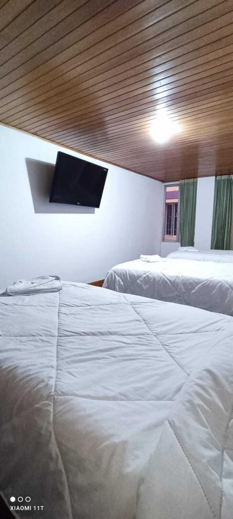 Executive Quadruple Room | Desk, free WiFi, bed sheets