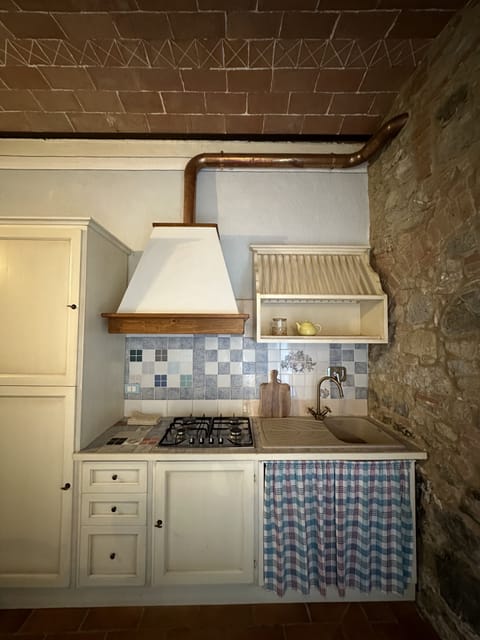 Apartment, 1 Bedroom | Private kitchen | Full-size fridge, stovetop, cookware/dishes/utensils