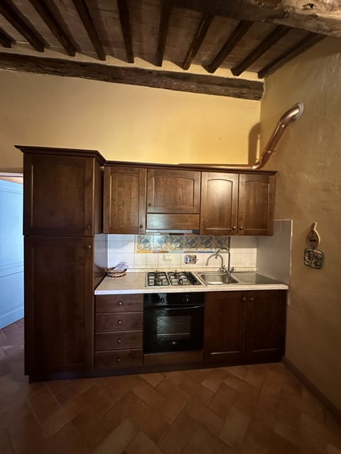 Apartment, 2 Bedrooms | Private kitchen | Full-size fridge, stovetop, cookware/dishes/utensils