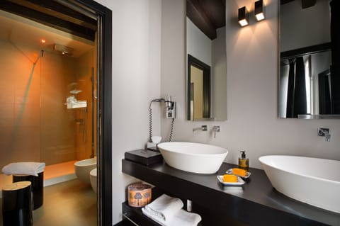 Rainfall showerhead, designer toiletries, hair dryer, bathrobes