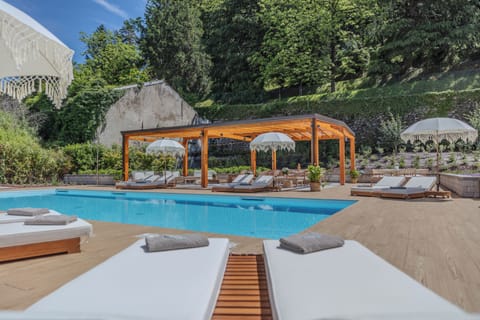 Seasonal outdoor pool, pool umbrellas, sun loungers