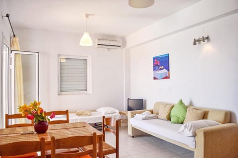 Family Apartment, Sea View | Living area | Flat-screen TV