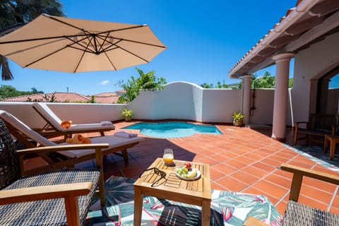 Outdoor pool, pool umbrellas, sun loungers