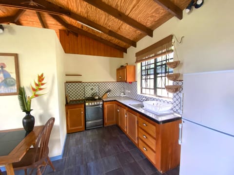 Cottage, Garden View | Private kitchen | Full-size fridge, oven, stovetop, coffee/tea maker