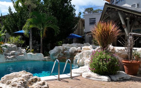 Outdoor pool, pool umbrellas, sun loungers