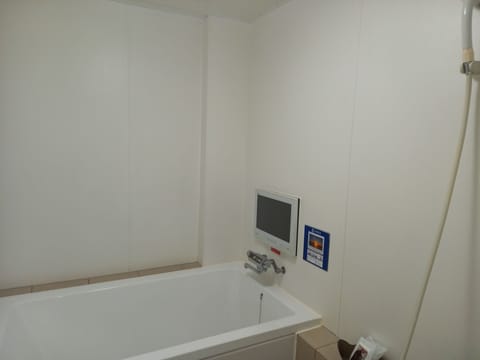 Economy Double Room | Bathroom | Separate tub and shower, free toiletries, hair dryer, bathrobes