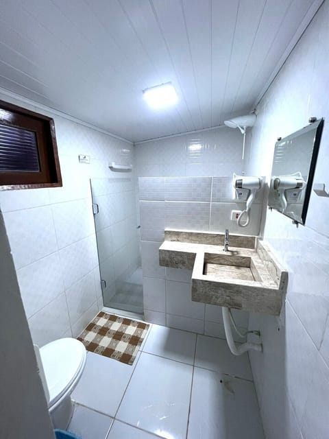 Comfort Suite | Bathroom | Shower, hair dryer, towels