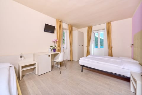 Panoramic Triple Room, Lake View | Premium bedding, down comforters, in-room safe, desk