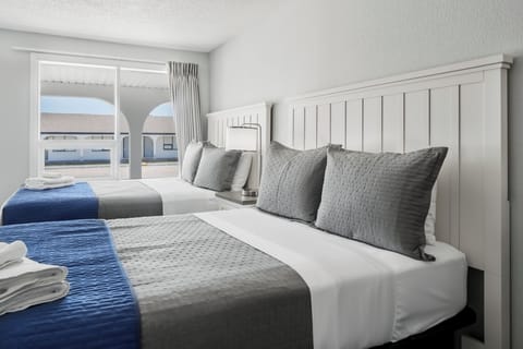 COURTYARD room, 2 Full XL Beds, Across the street from the Beach | Egyptian cotton sheets, premium bedding, individually furnished