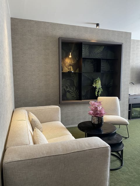 Deluxe Suite | Living area | Flat-screen TV