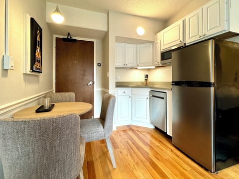 Suite, Two-Bedroom, 1 King & 2 Double Beds, Kitchen w/ Sofabed | Private kitchen | Full-size fridge, microwave, stovetop, dishwasher