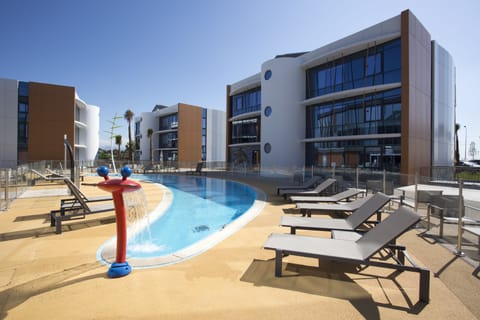 Seasonal outdoor pool, open 9:00 AM to 9:00 PM, sun loungers