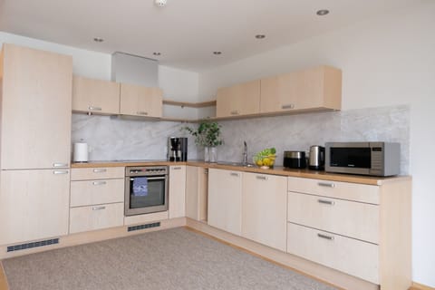 Apartment, 2 Bedrooms, Sauna | Private kitchen | Full-size fridge, microwave, oven, stovetop