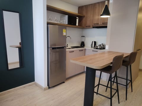 Elite Loft, 2 Bedrooms | Private kitchen | Full-size fridge, microwave, blender, cookware/dishes/utensils