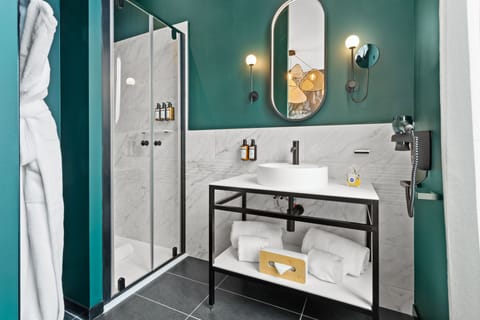 VOGUE | Bathroom | Rainfall showerhead, free toiletries, hair dryer, bathrobes