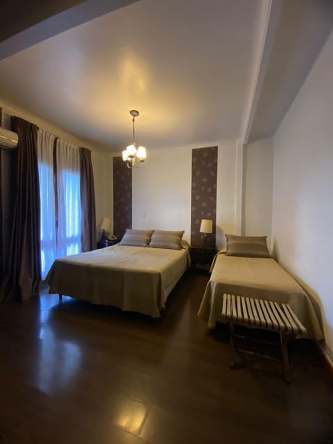 Family Triple Room, Multiple Beds | In-room safe, desk, free WiFi