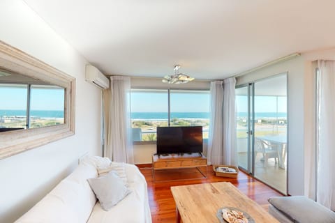 Family Apartment, Ocean View | Living area | Flat-screen TV