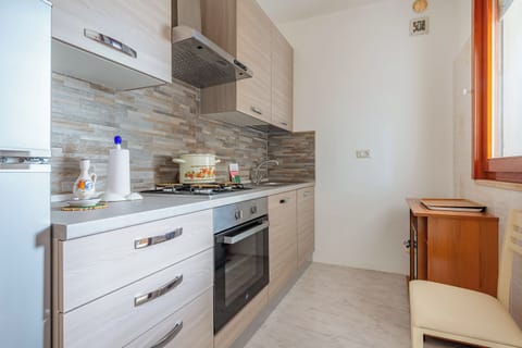 Family Apartment, 2 Bedrooms, 2 Bathrooms (Porta Di Mare Apartment) | Private kitchen | Fridge, microwave, oven, stovetop