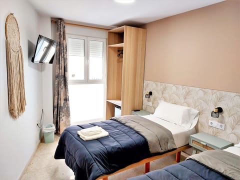 Comfort Twin Room, Shared Bathroom | Select Comfort beds, minibar, individually decorated