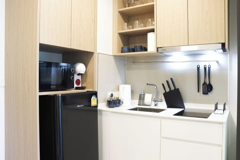 Comfort Apartment, 1 Bedroom | Private kitchen | Full-size fridge, microwave, stovetop, coffee/tea maker