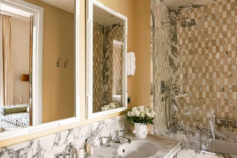 Suite | Bathroom | Designer toiletries, hair dryer, towels