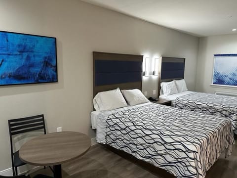 Family Room, 2 Queen Beds | Premium bedding, memory foam beds, desk, laptop workspace